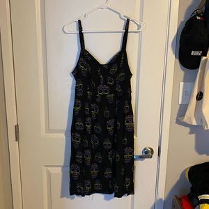 Black sun dress with rainbow skulls
